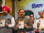 Himachal Pradesh CM Sukhvinder Singh Sukhu, Congress State president Pratibha Singh and others release the party’s election manifesto for the municipal corporation elections. Himachal Pradesh CM Sukhvinder Singh Sukhu, Congress State president Pratibha Singh and others release the party’s election manifesto for the municipal corporation elections.