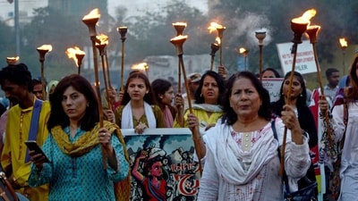 Activists of a labour union take part in a torch rally on the eve of Labour Day in Karachi. (Rizwan Tabassum / AFP) Activists of a labour union take part in a torch rally on the eve of Labour Day in Karachi. (Rizwan Tabassum / AFP)