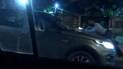 A police patrol vehicle chased the SUV, forcing its driver to stop and rescued the taxi driver. (ANI) A police patrol vehicle chased the SUV, forcing its driver to stop and rescued the taxi driver. (ANI)