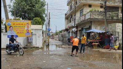A sewage overflowing in the Giaspura area in Ludhiana on Monday. (Manish/HT) A sewage overflowing in the Giaspura area in Ludhiana on Monday. (Manish/HT)