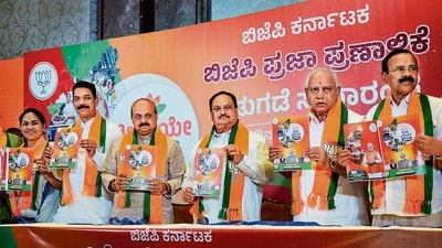BJP national president JP Nadda with Karnataka chief minister Basavaraj Bommai, former Karnataka chief minister BS Yediyurappa and senior party leaders releases the party's manifesto for the upcoming Karnataka Assembly elections, Bengaluru,May 1, 2023 (PTI) BJP national president JP Nadda with Karnataka chief minister Basavaraj Bommai, former Karnataka chief minister BS Yediyurappa and senior party leaders releases the party's manifesto for the upcoming Karnataka Assembly elections, Bengaluru,May 1, 2023 (PTI)