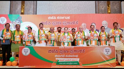 BJP president JP Nadda with Karnataka Chief Minister Basavaraj Bommai, former State Chief Minister BS Yediyurappa and others releases the party's election manifesto for the upcoming polls in Bengaluru on Monday. (ANI) BJP president JP Nadda with Karnataka Chief Minister Basavaraj Bommai, former State Chief Minister BS Yediyurappa and others releases the party's election manifesto for the upcoming polls in Bengaluru on Monday. (ANI)
