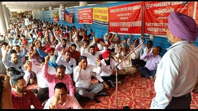 Chandigarh administration and municipal corporation employees holding a protest at Sector 17 in Chandigarh on Monday. (Keshav Singh/HT)