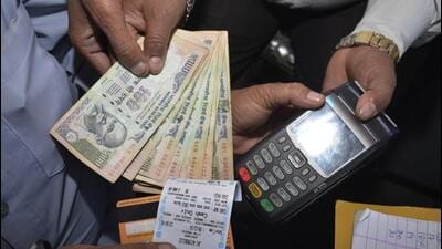 Currently, the food and civil supplies department is using PoS machines for the distribution of wheat under the schemes of the National Food Security Act, which covers 1.41 crore beneficiaries in the state. (HT File Photo)