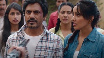 Nawazuddin Siddiqui and Neha Sharma star in the comedy Jogira Sara Ra Ra. Nawazuddin Siddiqui and Neha Sharma star in the comedy Jogira Sara Ra Ra.