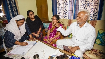 Patna: Enumerator staff receive information from residents during the second phase of caste census, in Patna. (PTI) Patna: Enumerator staff receive information from residents during the second phase of caste census, in Patna. (PTI)
