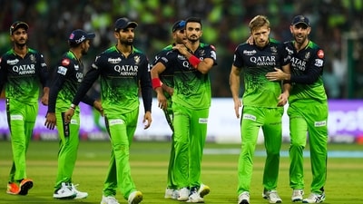 Royal Challengers Bangalore bowler David Willey with teammates celebrates the wicket of Rajasthan Royals batter Devdutt Padikkal (PTI) Royal Challengers Bangalore bowler David Willey with teammates celebrates the wicket of Rajasthan Royals batter Devdutt Padikkal (PTI)