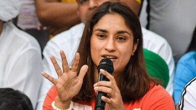 Wrestler Vinesh Phogat speaks with the media during their protest at Jantar Mantar, in New Delhi, on Sunday. (PTI) Wrestler Vinesh Phogat speaks with the media during their protest at Jantar Mantar, in New Delhi, on Sunday. (PTI)