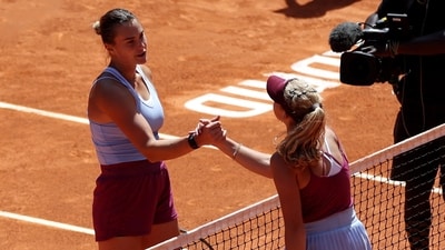 Tennis - Madrid Open - Park Manzanares, Madrid, Spain - May 1, 2023 Belarus' Aryna Sabalenka shakes hands with Russia's Mirra Andreeva after winning their round of 16 match REUTERS/Isabel Infantes (REUTERS)