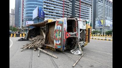 The truck turned turtle after it overturns near Ekmurti Chowk in Greater Noida West on Monday. (Sunil Ghosh/HT Photo) The truck turned turtle after it overturns near Ekmurti Chowk in Greater Noida West on Monday. (Sunil Ghosh/HT Photo)