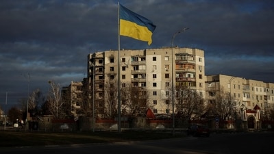 Spy Balloons In Ukraine: A Ukrainian national flag flutters near the buildings destroyed by Russian military strike, amid Russia's invasion of Ukraine, in the town of Borodianka, in Kyiv. (Reuters)