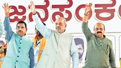 Union Ministers and senior BJP leaders Amit Shah and Pralhad Joshi (L) with Karnataka Chief Minister Basavaraj Bommai (R). (PTI)