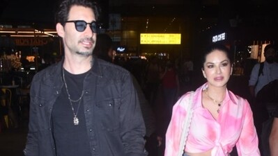 Sunny Leone and her husband Daniel Weber were seen in Mumbai. For the outing, Sunny wore a knotted pink shirt and denims. Daniel opted for a black T-shirt under a matching shirt and denims. Sunny Leone and her husband Daniel Weber were seen in Mumbai. For the outing, Sunny wore a knotted pink shirt and denims. Daniel opted for a black T-shirt under a matching shirt and denims.