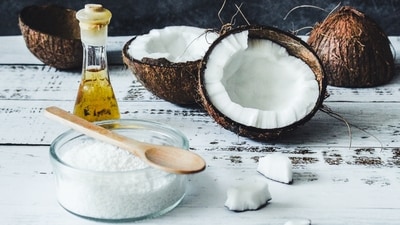 Coconut Oil: Massaging the scalp with coconut oil can help moisturize the scalp and prevent further hair loss.&nbsp; (Unsplash)