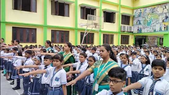 Students of St Joseph group of educational institutions took oath to motivate parents and neighbours for 100% polling in civic body elections (HT Photo)