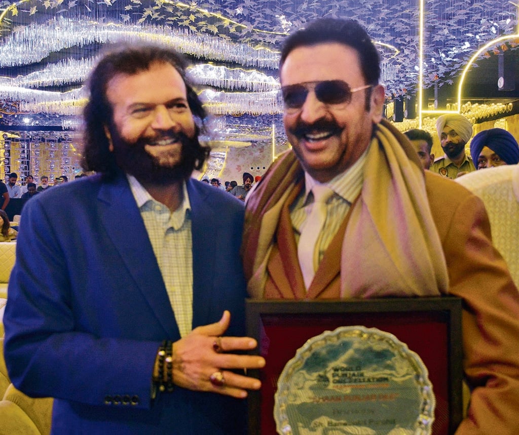 Actor Gulshan Grover with Sufi singer Hans Raj Hans Actor Gulshan Grover with Sufi singer Hans Raj Hans