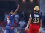 Lucknow Super Giants' Amit Mishra celebrates the wicket of Royal Challengers Bangalore's Suyash Prabhudessai , right, during the Indian Premier League (IPL) match between Lucknow Super Giants and Royal Challengers Bangalore in Lucknow, India, Monday, May 1, 2023. (AP Photo/Surjeet Yadav)