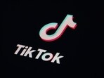The icon for the video sharing TikTok app is seen on a smartphone. The icon for the video sharing TikTok app is seen on a smartphone.