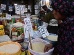 Pakistan Economic Crisis: A woman checks rice prices at a main wholesale market in Karachi. 