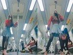 Woman dances in Delhi Metro. Woman dances in Delhi Metro.
