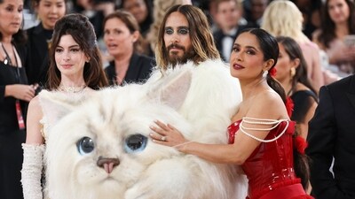 Anne Hathaway opted for a white dress while Salma Hayek wore a red outfit at the Met Gala. Jared Leto dressed as Karl Lagerfeld's cat Choupette. (Reuters)&nbsp; 