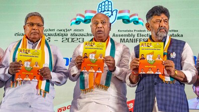 Congress president Mallikarjun Kharge with Karnataka Congress president DK Shivakumar and senior party leader Siddaramaiah in Bengaluru on Tuesday. (PTI) Congress president Mallikarjun Kharge with Karnataka Congress president DK Shivakumar and senior party leader Siddaramaiah in Bengaluru on Tuesday. (PTI)
