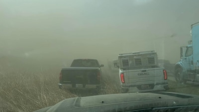 A view of vehicles in a dust storm, which cut visibility to near zero and triggered a series of chain-reaction crashes involving dozens of vehicles, on a highway in Springfield, Illinois. (Reuters)
