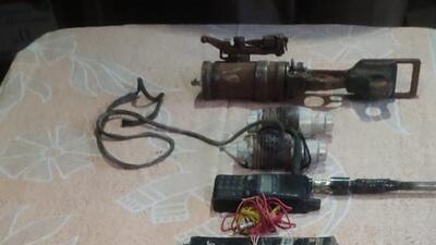 Jammu and Kashmir Police recovered two rifle grenades, two IEDs, a detonator with wire, 17 cartridges of AK-47 and other ammunition from the hideout in Ramban. (HT Photo)