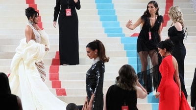 Kim Kardashian opted for a cream outfit for the Met Gala. Kendall Jenner was seen in a black dress while Kylie Jenner wore a red outfit. (Reuters) 
