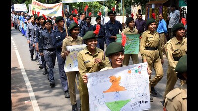 NCC cadets and school students take part in a voter awareness rally taken out ahead of the first phase of the civic polls, in Lucknow on Tuesday (HT Photo)