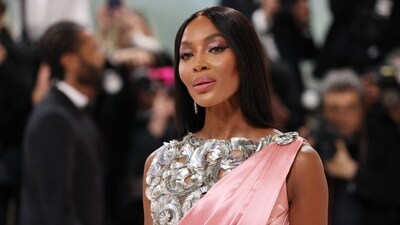 Naomi Campbell arrived at the event dressed in a pink and silver saree gown. (Reuters) 
