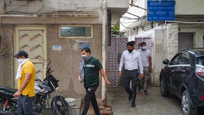 Relatives of Tillu Tajpuria, a jailed gangster and an accused in the 2021 Rohini court shootout case, outside the mortuary of Deen Dayal Upadhyay Hospital, in New Delhi, Tuesday. (PTI Photo) Relatives of Tillu Tajpuria, a jailed gangster and an accused in the 2021 Rohini court shootout case, outside the mortuary of Deen Dayal Upadhyay Hospital, in New Delhi, Tuesday. (PTI Photo)