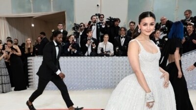 Alia Bhatt made her debut in Met Gala this year as she decked up in a white gown with 100,000 pearls. She also paid homage to Karl Lagerfeld's cat Choupette and her cat Edward. “I have always been fascinated by the iconic Chanel brides. Season after season, the genius of Karl Lagerfeld shone through in the most innovative and awe-inspiring couture. My look tonight was inspired from this and in particular by supermodel Claudia Schiffer’s 1992 Chanel bridal look,” Alia explained her look. (Instgram/@aliabhatt) Alia Bhatt made her debut in Met Gala this year as she decked up in a white gown with 100,000 pearls. She also paid homage to Karl Lagerfeld's cat Choupette and her cat Edward. “I have always been fascinated by the iconic Chanel brides. Season after season, the genius of Karl Lagerfeld shone through in the most innovative and awe-inspiring couture. My look tonight was inspired from this and in particular by supermodel Claudia Schiffer’s 1992 Chanel bridal look,” Alia explained her look. (Instgram/@aliabhatt)