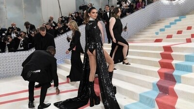 Kendall Jenner aced the red carpet look in a black sequined monokini with matching trains from both sides. (AP) Kendall Jenner aced the red carpet look in a black sequined monokini with matching trains from both sides. (AP)