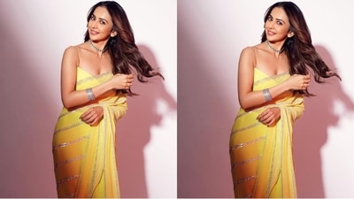 Complementing her saree perfectly, Rakul Preet chose a lemon yellow blouse with delicate stripes and a plunging sweetheart neckline. (Instagram/@rakulpreet)