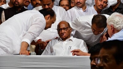Sharad Pawar announced his exit for the post of the party supremo at the launch of his autobiography which too contains explosive revelations about Maharashtra politics. (Praful Gangurde/ HT photo)