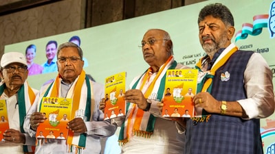 Congress President Mallikarjun Kharge with Karnataka Congress President DK Shivakumar and senior party leader Siddaramaiah releases the party's manifesto for the upcoming Karnataka Assembly elections, in Bengaluru. (PTI) Congress President Mallikarjun Kharge with Karnataka Congress President DK Shivakumar and senior party leader Siddaramaiah releases the party's manifesto for the upcoming Karnataka Assembly elections, in Bengaluru. (PTI)