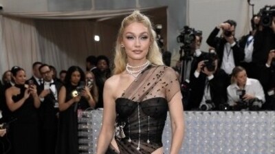 GIGI Hadid's black gown with see-through mesh details, further decorated in black embellishments, completed with a mesh train was a win at Met Gala this year. (AP) GIGI Hadid's black gown with see-through mesh details, further decorated in black embellishments, completed with a mesh train was a win at Met Gala this year. (AP)