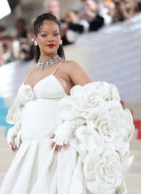 Rihanna poses at the Met Gala. (REUTERS)