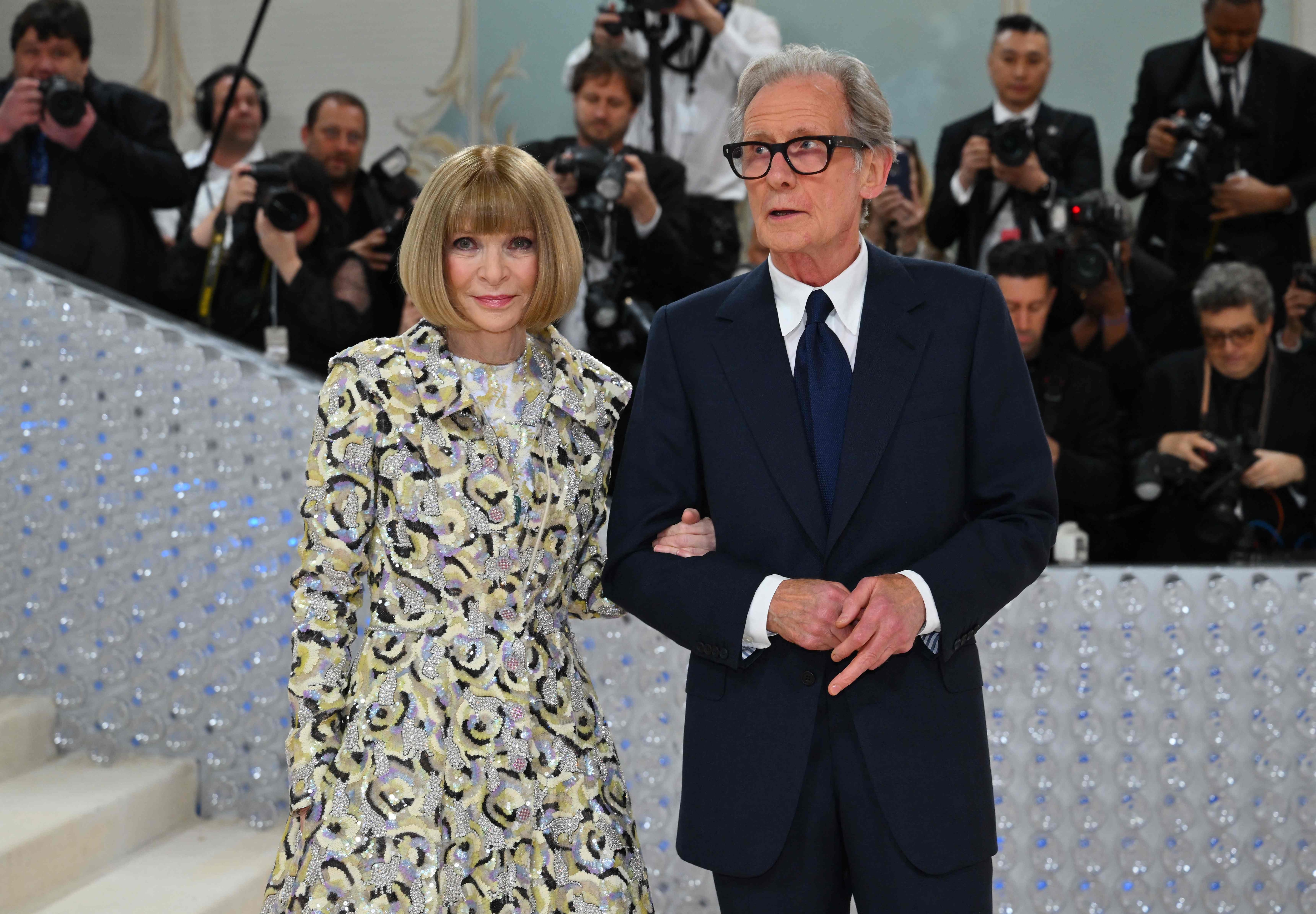Vogue Editor-in-Chief Anna Wintour and English actor Bill Nighy arrive for the 2023 Met Gala at the Metropolitan Museum of Art on May 1, 2023, in New York. - The Gala raises money for the Metropolitan Museum of Art's Costume Institute. The Gala's 2023 theme is �Karl Lagerfeld: A Line of Beauty.� (Photo by Angela WEISS / AFP) (AFP)