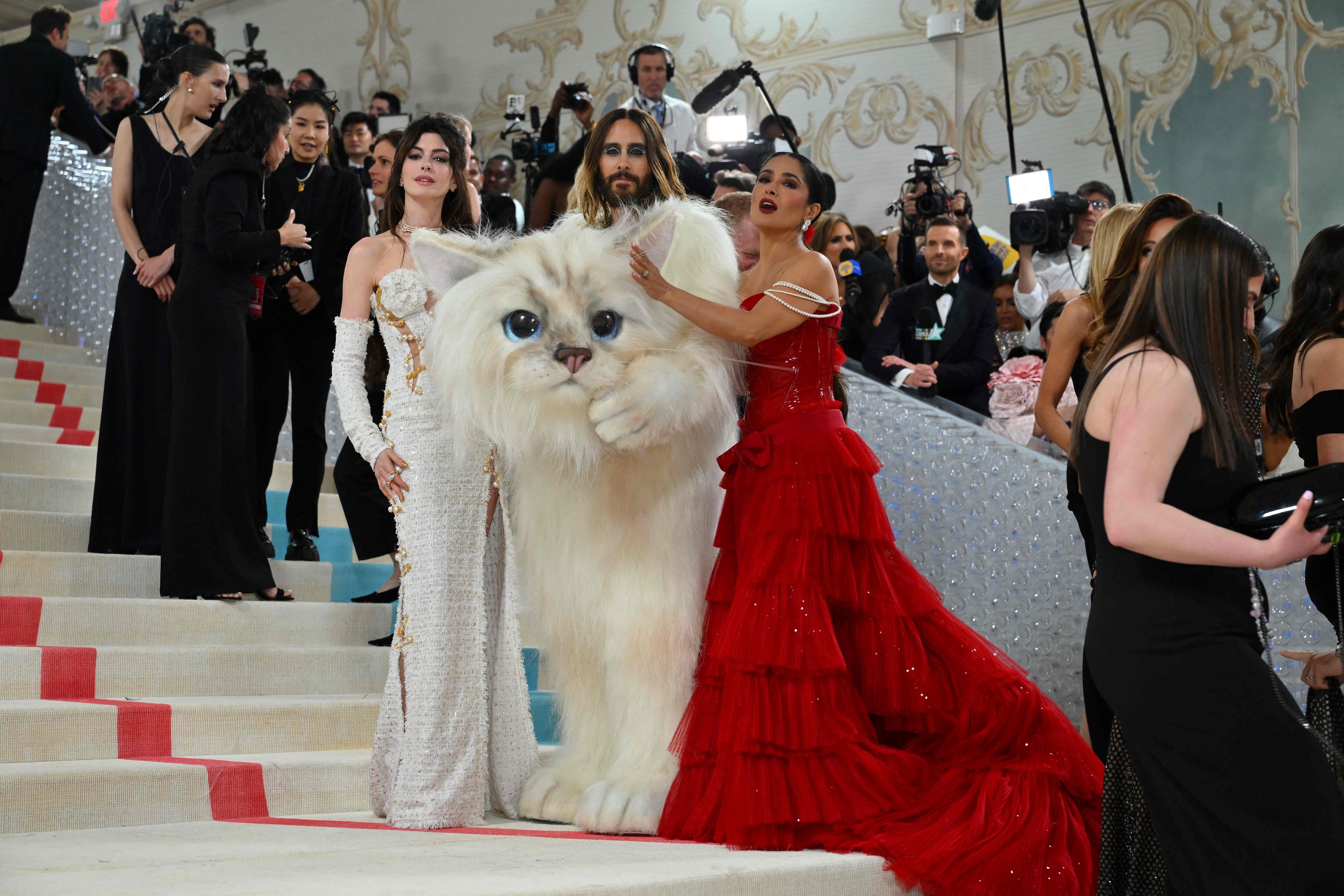 Anne Hathaway, Jared Leto and Salma Hayek arrive for the 2023 Met Gala. (AFP)