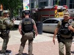 Officers set up near the scene of an active shooter on Wednesday, May 3, 2023 in Atlanta. Officers set up near the scene of an active shooter on Wednesday, May 3, 2023 in Atlanta.