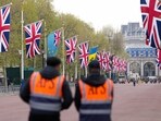 Union Jack flags are seen ahead of King Charles' coronation at the Mall, in London, Britain, May 3, 2023. King Charles III's coronation will be different from that of his mother, Queen Elizabeth II. Here's how 
