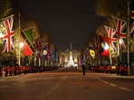 Members of the military march near Buckingham Palace in central London, during a rehearsal for the coronation of King Charles III which will take place at Westminster Abbey on May 6. Members of the military march near Buckingham Palace in central London, during a rehearsal for the coronation of King Charles III which will take place at Westminster Abbey on May 6.