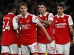 Arsenal's Norwegian midfielder Martin Odegaard (2L) celebrates with teamates Arsenal's Norwegian midfielder Martin Odegaard (2L) celebrates with teamates