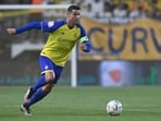 Cristiano Ronaldo runs with the ball the Saudi Pro League football match. Cristiano Ronaldo runs with the ball the Saudi Pro League football match.