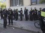 Police officers stand outside the 'Protestant School Neukoelln' in Berlin, Germany. 