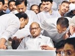 Sharad Pawar with his nephew Ajit Pawar and senior NCP leader Praful Patel