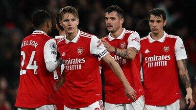 Arsenal's Norwegian midfielder Martin Odegaard (2L) celebrates with teamates (AFP) Arsenal's Norwegian midfielder Martin Odegaard (2L) celebrates with teamates (AFP)