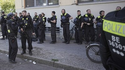 Police officers stand outside the 'Protestant School Neukoelln' in Berlin, Germany. (AP)